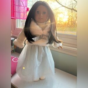 American girl Doll with Black Hair and blue eyes.